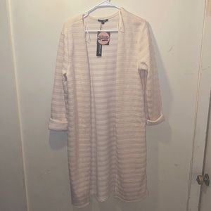 Cream colored striped cardigan. Brand new